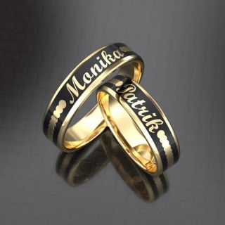 Svadobné obrúčky zo 14 karátového zlata zdobené čiernym coloritom. https://www.zlatino.sk/svadobne-obrucky-lumina/ #zlato...